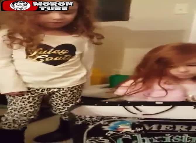 Video :This child bursts into tears after being given a Doll in black